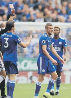  ??  ?? Leicester City’s Jamie Vardy receives a red card against Wolves.