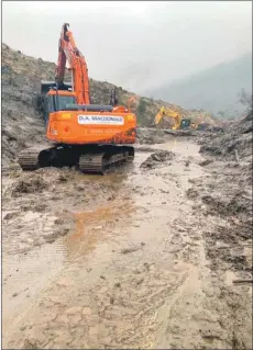  ??  ?? Hard at work clearing the A83 and making it safe.