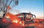  ?? AFP ?? ■ A bus in flames after being hit by a rocket fired from the Gaza Strip at the IsraelGaza border on Monday.