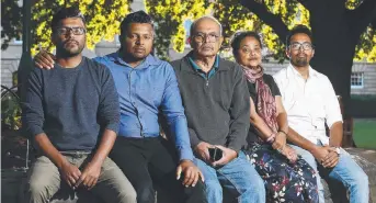  ?? Picture: MATT THOMPSON ?? DEVASTATED: Members of Hobart’s Sri Lankan community Eranda Hettige, Nuwan Chamara Mananage, Guna Gunadasa, Tamara Ward and Erashan Joseph.