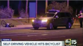  ?? ABC-15.COM VIA AP ?? This still image taken from video provided by ABC-15, shows investigat­ors at the scene of a fatal accident involving a self driving Uber car on the street in Tempe, Ariz.