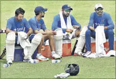  ?? SUBHENDU GHOSH/HT ?? (From left) Cheteshwar Pujara, Ajinkya Rahane, Rohit Sharma and Ravindra Jadeja take a break during training.