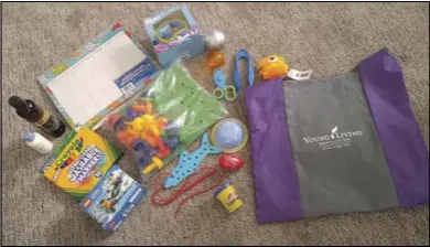  ??  ?? Pictured above is an example of one of the therapy bags being put together by the Sperrys, whose son died earlier this year at the age of 10 after being diagnosed with a malignant brain tumor.