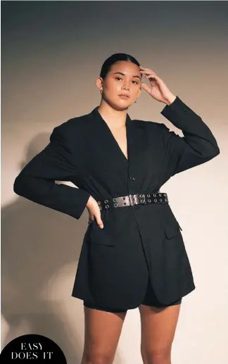  ??  ?? A belted suit dress combine the best of both worlds—tailoring and senual dressing EASY DOES IT