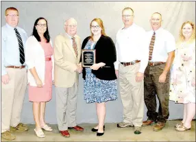  ?? SUBMITTED PHOTO ?? Emily Paul, a 2011 McDonald County High School graduate, was recognized as the top new agricultur­e education teacher in Missouri. Pictured are, from left, Jack Green, Cindy Schuknecht, Bill Northcutt, Paul, Doyle Justus, Jayson Shriver and Tiffany Kauffman.