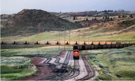 ?? ?? A train loaded with newly mined coal near Gillette, Wyoming. Photograph: Tannen Maury/EPA