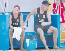  ?? DARREN CALABRESE/THE CANADIAN PRESS ?? Canada’s Sam Schachter, left, and Josh Binstock make up one of four Canadian teams in Rio that should have a chance at reaching the podium.