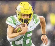  ?? Stephen Brashear Associated Press ?? TRAVIS DYE led the Pac-12 in all-purpose yards. He leaves Oregon ranked fifth on its all-time rushing list.