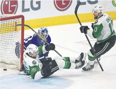  ?? RENE JOHNSTON/TORONTO STAR ?? Texas Stars captain Curtis McKenzie beats Marlies goaltender Garret Sparks to open the scoring in Game 6 of the Calder Cup final. The Stars scored three times in the second period to force a Game 7, to be played Thursday at Ricoh Coliseum.