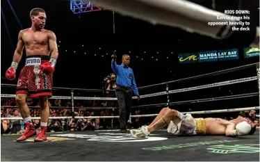  ?? Photos: RYAN HAFEY/PREMIER BOXING CHAMPIONS ?? RIOS DOWN: Garcia drops his opponent heavily to the deck