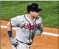  ?? MATT SLOCUM/AP ?? Austin Riley rounds the bases after hitting a two-run homer in the second inning Sunday in Philadelph­ia.