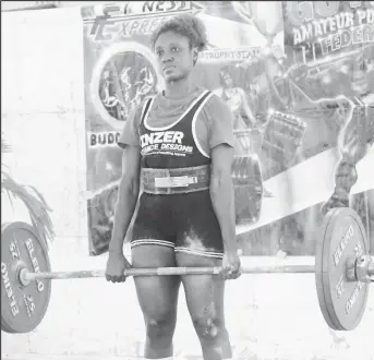  ?? ?? One of Guyana’s premier powerlifte­rs Keisha Abrigo performing the deadlift