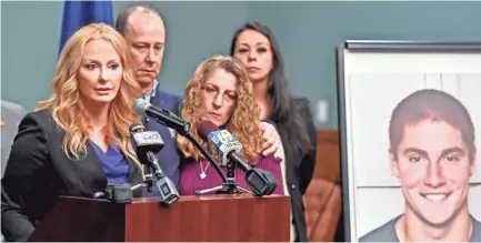  ??  ?? Centre County, Pa., DA Stacy Parks Miller announces findings in in the death of Penn State University fraternity pledge Tim Piazza in 2017. His parents, Jim and Evelyn Piazza, are leading an anti-hazing campaign. ABBY DREY/CENTRE DAILY TIMES VIA AP