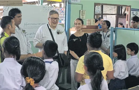  ??  ?? EU Ambassador Pirkka Tapiola, third left, had lots of questions to ask Myanmar Muslim migrant students and their teachers, showing genuine concern about their future and well-being.