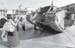  ?? ASSOCIATED PRESS FILE PHOTO ?? A replica World War 1 Mk IV is displayed in Trafalgar Square in London to mark the 100th anniversar­y of the first use of the tank in battle during the Battle of the Somme.