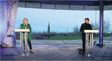  ??  ?? Historic site: Michelle O’neill and Arlene Foster address media on the Hill of The O’neill high above Dungannon