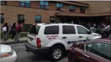  ?? MID-HUDSON NEWS NETWORK ?? Police vehicles are parked outside Poughkeeps­ie High School on Tuesday.