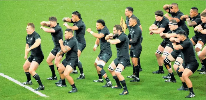  ?? Photos / Photosport, Getty Images, AP ?? New Zealand women’s sevens stars Mahina Paul (left) and Stacey Waaka celebrate success in Singapore; the All Blacks (above) remain on top of the world; Lando Norris (below, left) is chaired off in Miami and US President Joe Biden (right) has cost NZ another team in the NRL.