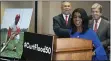  ?? ALEX BRANDON — THE ASSOCIATED PRESS ?? Rep. William Lacy Clay, D-Mo., left, and Sen. Roy Blunt, R-Mo., right, stand as Judy Pace Flood speaks during a news conference as they call for the late Curt Flood to be inducted into the Baseball Hall of Fame, on Thursday in Washington.