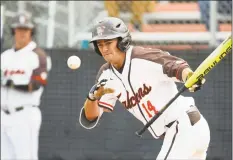  ?? Rick Osentoski / Associated Press ?? Bowling Green’s Neil Lambert bats during a 2019 game against Kent Sate in Bowling Green, Ohio. Bowling Green recently announced that it is dropping baseball to reduce the athletics department’s operating budget by $2 million.