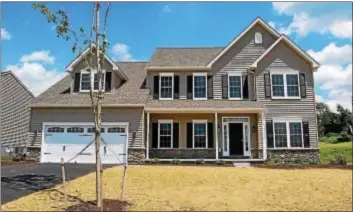  ?? SUBMITTED PHOTO ?? This popular “Carson” model is well appointed and offers first floor desirable architectu­ral features such as bull nose corners, 9-foot ceilings, stunning foyer and hardwood floors.