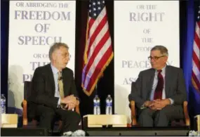  ?? AP PHOTO/TED ANTHONY ?? Martin Baron, left, executive editor of The Washington Post, speaks as David Shribman, executive editor of Pittsburgh Post-Gazette, listens at the National First Amendment Conference in Pittsburgh on Monday.