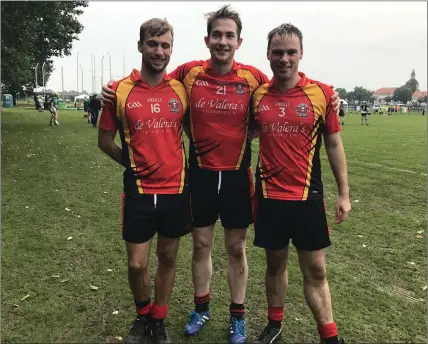  ??  ?? Darragh Burke, Tomás Baynes and Pádraic Burke following their side’s victory.