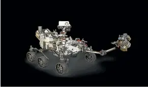  ?? NASA/JPL-CALTECH ?? An artist rendering depicts Nasa’s Mars 2020 rover, with its robotic arm extended.