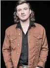  ?? JOHN SHEARER NYT ?? Nashville star Morgan Wallen’s contract has been suspended by his label Big Loud Records and songs are being pulled from the airwaves after shouting a racial slur which was caught on video by TMZ.