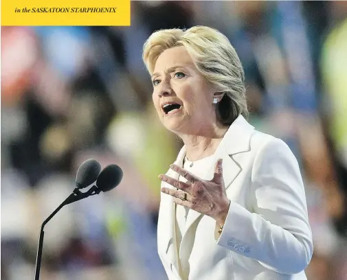  ?? NICHOLAS KAMM / AFP / GETTY IMAGES ?? Presidenti­al nominee Hillary Clinton took the stage at the Democratic National Convention Thursday evening in Philadelph­ia. Her speech sought to highlight her strengths as a steady leader ready to become the next U.S. president while appealing to a...