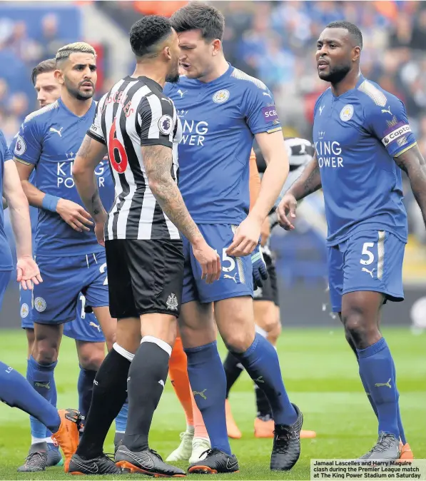  ??  ?? Jamaal Lascelles and Harry Maguire clash during the Premier League match at The King Power Stadium on Saturday