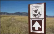  ?? ASSOCIATED PRESS ?? A SIGN MARKS A trail on the Rocky Flats National Wildlife Refuge outside Denver on Saturday, the first day the refuge was open to the public.