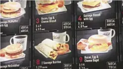  ??  ?? The city and feds are in a squabble over fast food restaurant­s displaying calorie counts. McDonald’s (above) already provides info.