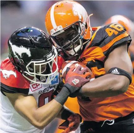  ?? — CP FILES ?? The Lions have signed Rolly Lumbala, right, to a two-year contract extension. The 32-year-old fullback is the longest-tenured player on the roster, with 10 seasons in B.C. already under his belt.