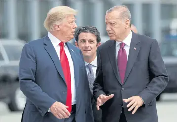  ?? REUTERS ?? US President Donald Trump and his counterpar­t Recep Tayyip Erdogan talk at the start of a Nato summit earlier this month.