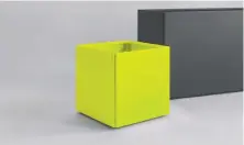  ?? GREEN THEORY ?? An aluminum planter by Green Theory offers a pop of bright colour in a simple, elegant design for home decor.