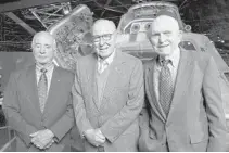  ?? J.B. SPECTOR/AP ?? Apollo 8 astronauts, from left, William Anders, James Lovell, Frank Borman, at the Chicago Museum of Science and Industry on April 5.