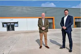 ?? ?? Rupert Jeffries from Collingwoo­d Rigby (left), with Ed Atkin from Schroders Capital on Hartlebury Trading Estate in Kiddermins­ter