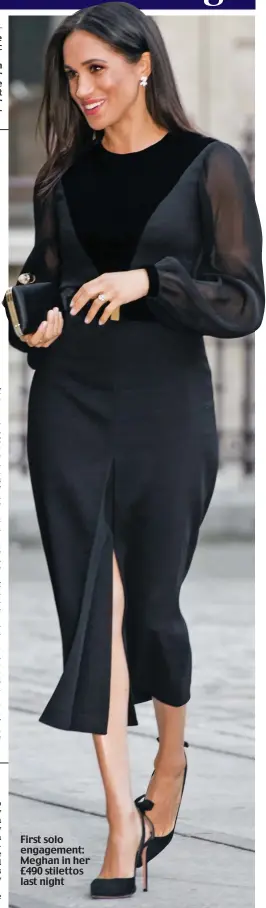  ??  ?? First solo engagement: Meghan in her £490 stilettos last night