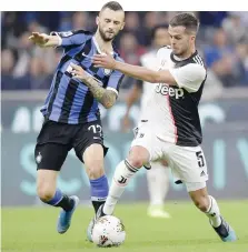  ?? GETTY IMAGES ?? Brozovic in lotta con Pjanic durante Inter-Juve