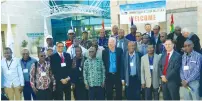  ?? (Sharon Udasin) ?? PARTICIPAN­TS IN THIS week’s sustainabl­e agricultur­e conference pose yesterday with Agricultur­e Minister Uri Ariel and MASHAV head Gil Haskel (fifth and second from right, respective­ly) outside the Volcani Center in Beit Dagan.