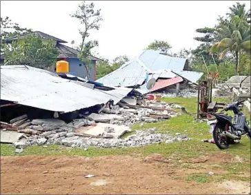  ?? BNPB/AFP ?? Victims of the 6.5 magnitude earthquake which displaced nearly 135,000 people in the remote Maluku islands last month are afraid to return home as fake news stories predict aftershock­s and a tsunami.