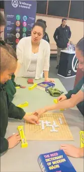  ??  ?? STUDENTS playing Hanga Kupu (Scrabble).