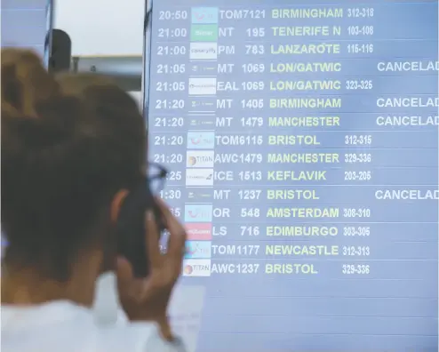  ?? Borja Suarez
/ reuters ?? A Thomas Cook passenger at Las Palmas Airport in Spain after the world’s oldest travel firm collapsed on Monday.