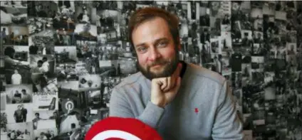  ?? AP PHOTO/BEN MARGOT ?? Pinterest co-founder and chief product officer, poses for a photo in his office beside a wall of pinned photos he has taken at Pinterest headquarte­rs in San Francisco. “Social media is about sharing what you are doing with other people,” said Sharp. “Pinterest isn’t about sharing. It’s mostly about yourself, your dreams, your ideas you want for your future.”