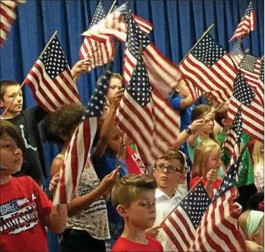  ?? SUBMITTED PHOTO ?? Students at Durhamvill­e Elementary School celebrated Flag Day on June 14.