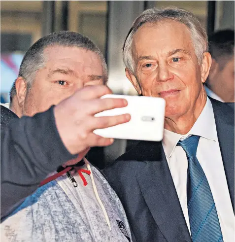  ??  ?? Tony Blair stops for a photograph after his interview on BBC Radio 4’s Today programme yesterday morning. He insisted democratic debate had not finished with the Brexit vote