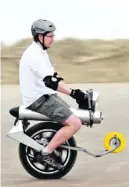  ??  ?? The Mega Hub Motor Electric Unicycle is a long name for a very small bike