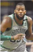  ?? STAffpHoTo byCHRISTop­HEREVANS ?? INSIDE JOB: Greg Monroe has begun to convert shots at a higher rate, which will help the Celtics in the postseason.