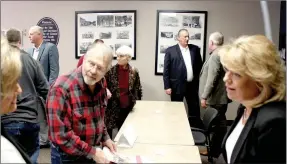  ?? Michael Burchfiel/Herald-Leader ?? After prepared remarks and a question-and-answer session, Rep. Dan Douglas, Rep. Robin Lundstrum and Senator Jim Hendren held a brief meet and greet with Siloam Springs residents in the Arvest Community Room downtown.